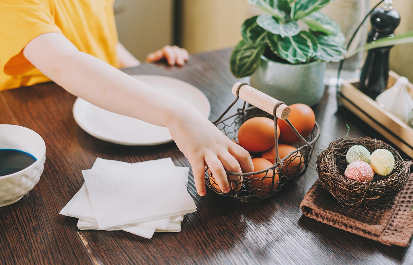easter-hands-kid-boy-painting-eggs-wooden-table-background-child-preparing-easter